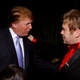 Trump and John hobnobbing at an AIDS fundraiser in 2004. (Photo: Getty Images)